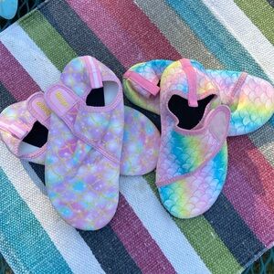 Two pairs (available separately) of girls slip on water shoes